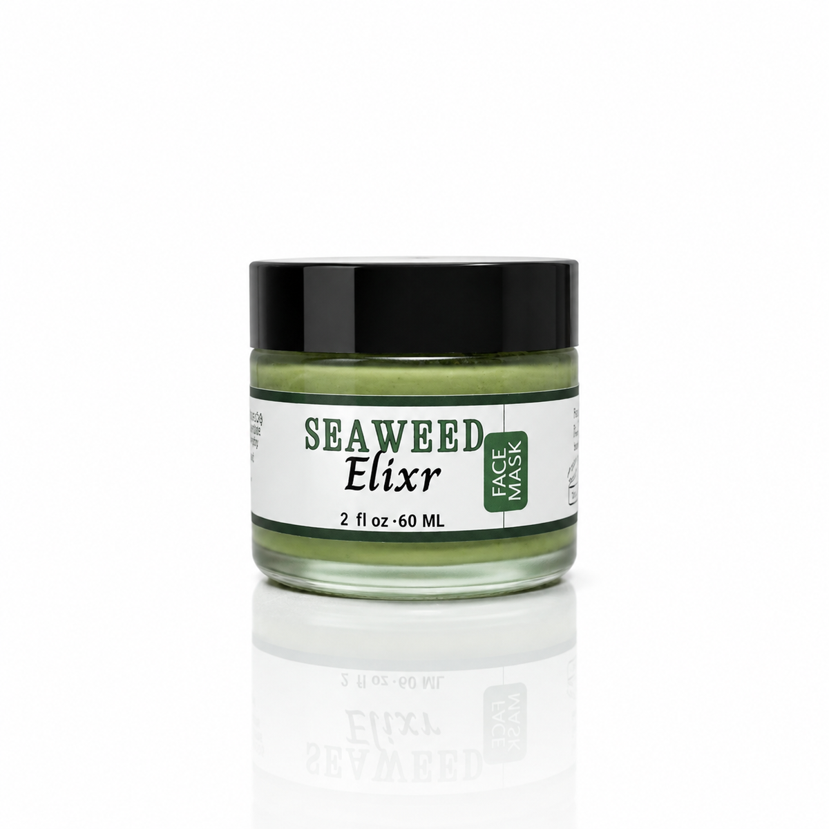 Innes Ageless Beauty Seaweed Elixir Face Mask in a 2 fl oz glass jar with a black lid on a white reflective background