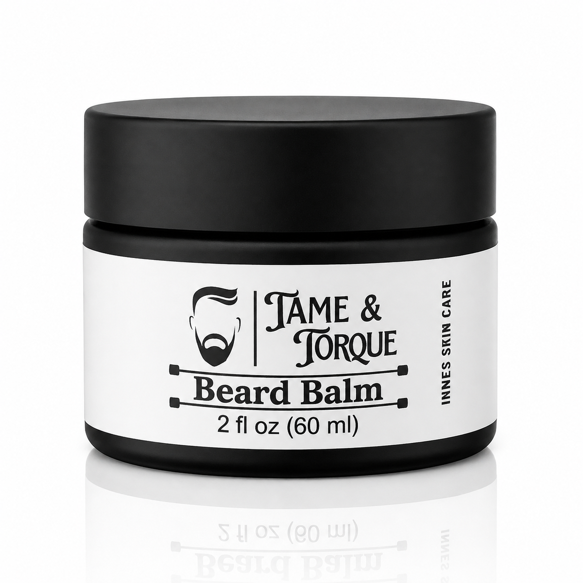Tame & Torque Beard Balm for men by Innes Skin Care in a black 2 oz jar, designed to condition, soften, and help control facial hair.