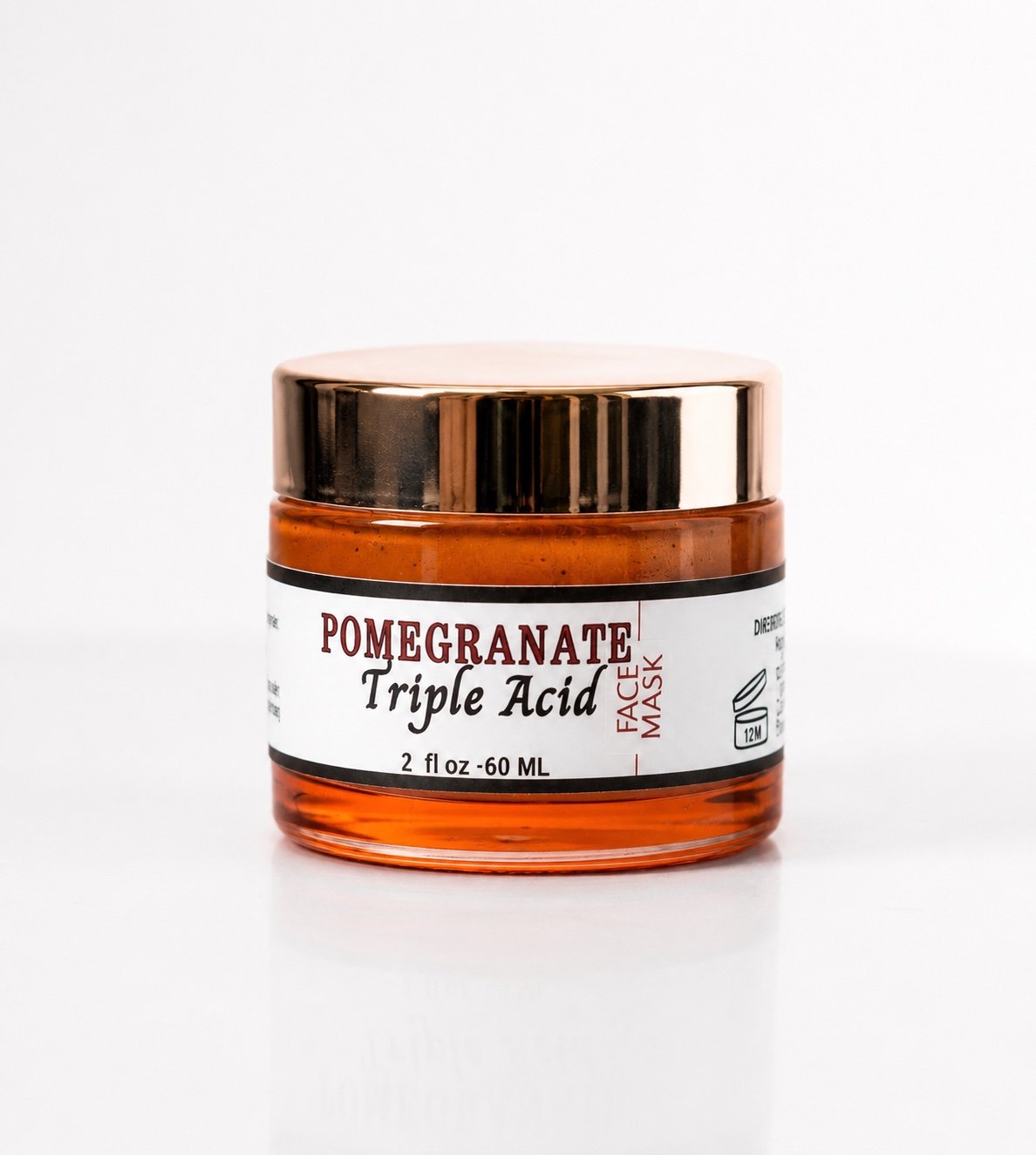 Innes Ageless Beauty Pomegranate Triple Acid Face Mask in a 2 oz amber jar with a rose-gold lid on a white background