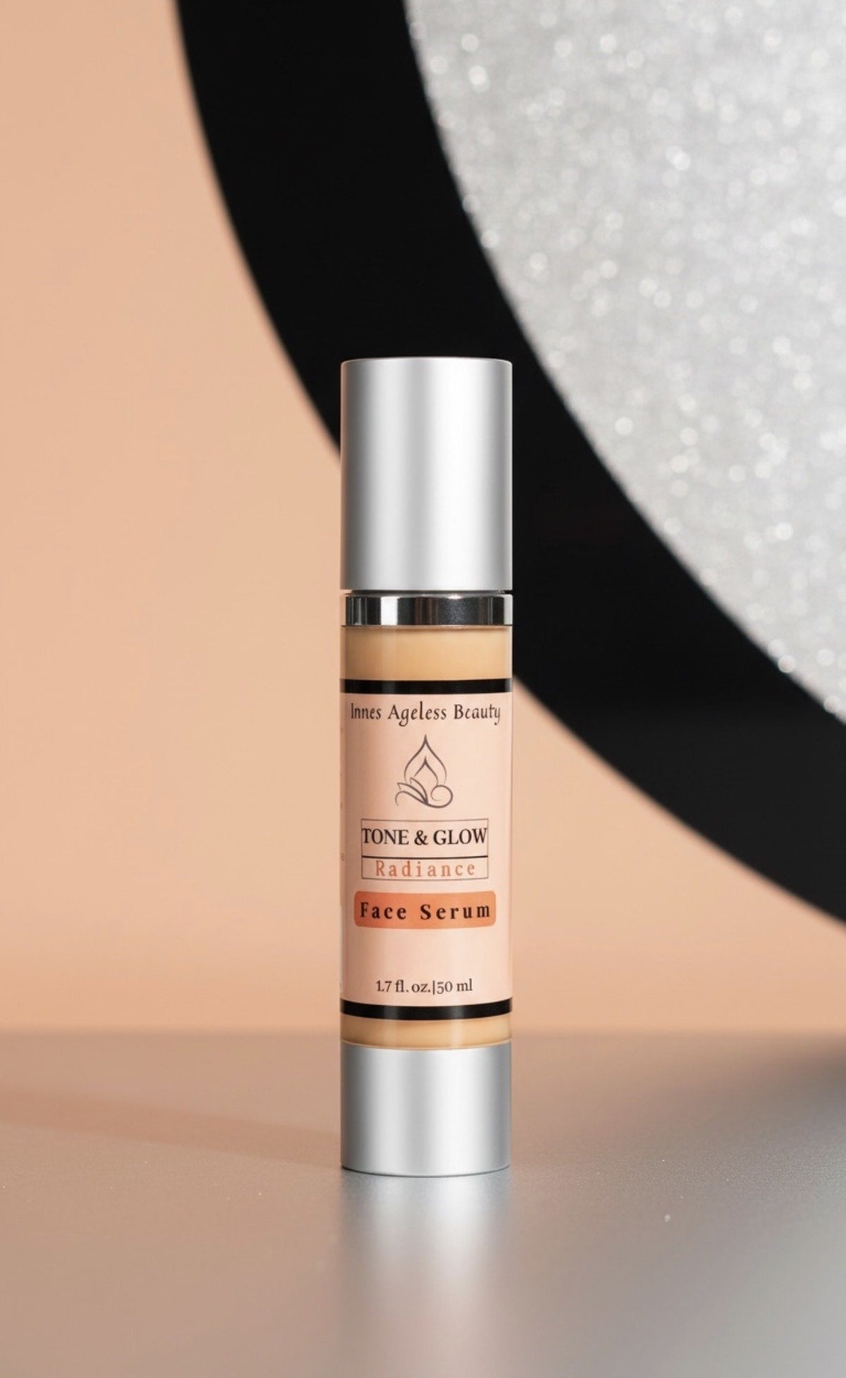 Tone and Glow Radiance Face Serum 1.7oz bottle by Innes Ageless Beauty.