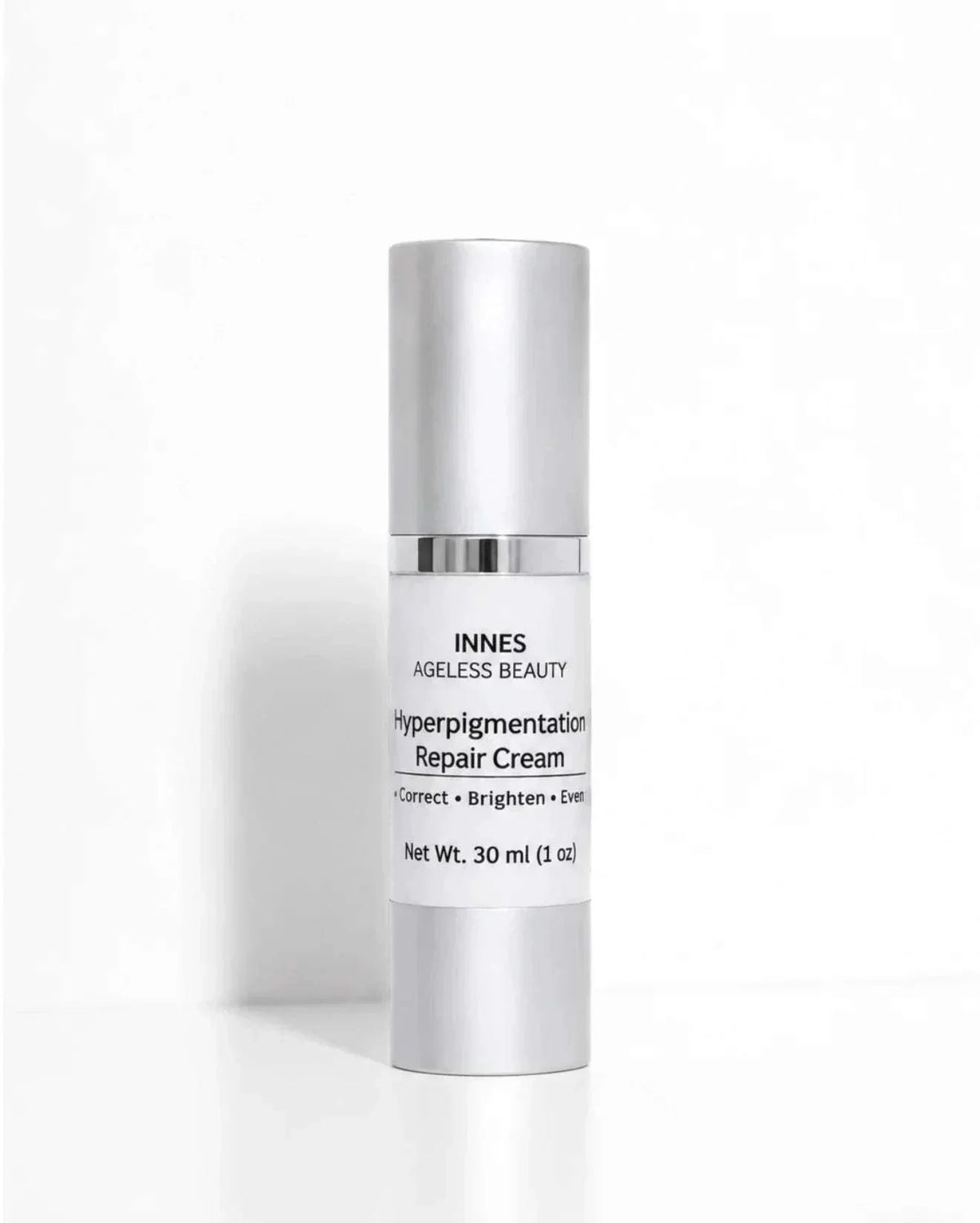 Hyperpigmentation Repair Cream in a white cylindrical bottle with a silver cap and black label text.