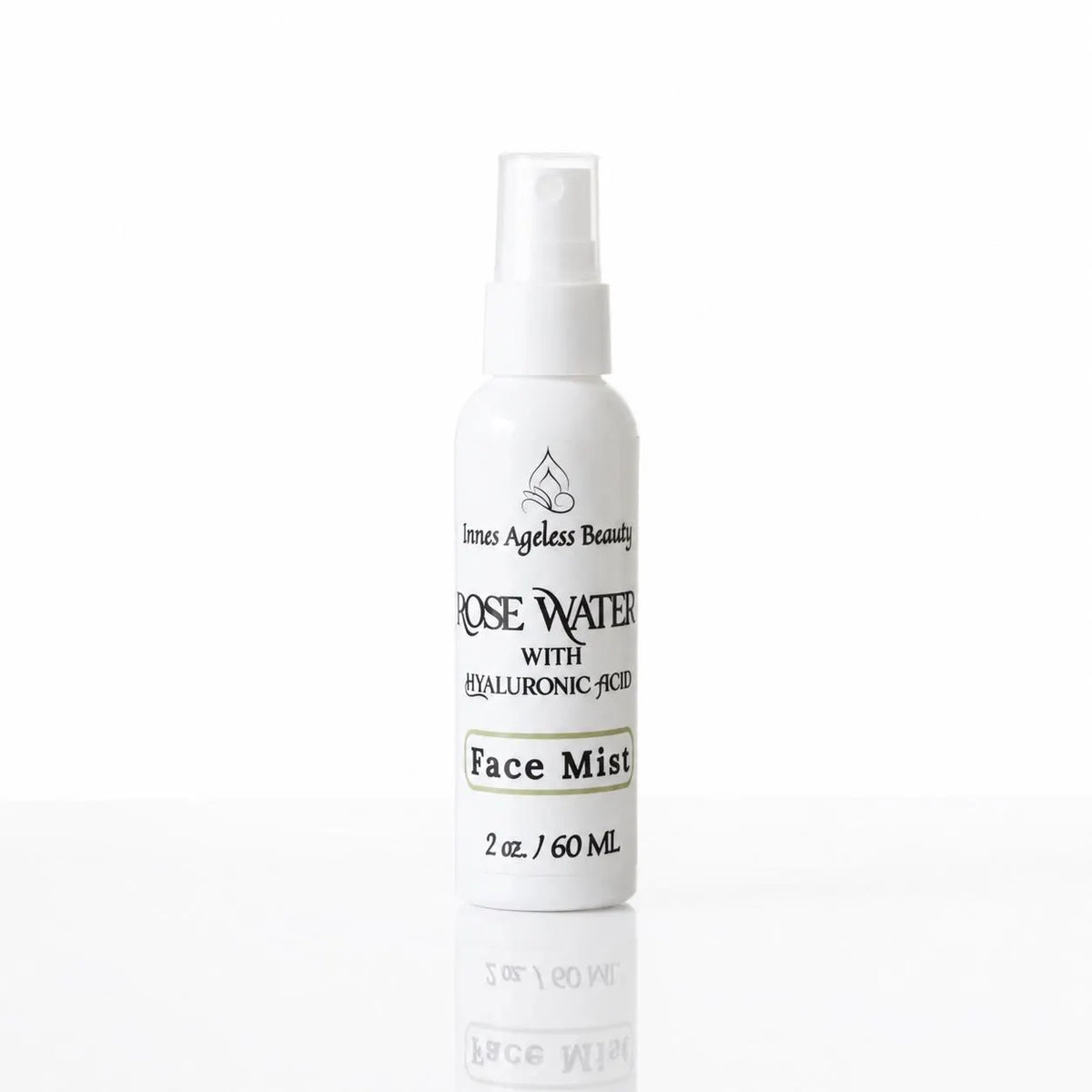 Innes Ageless Beauty Rose Water Face Mist with hyaluronic acid in a 2 oz spray bottle on a white background