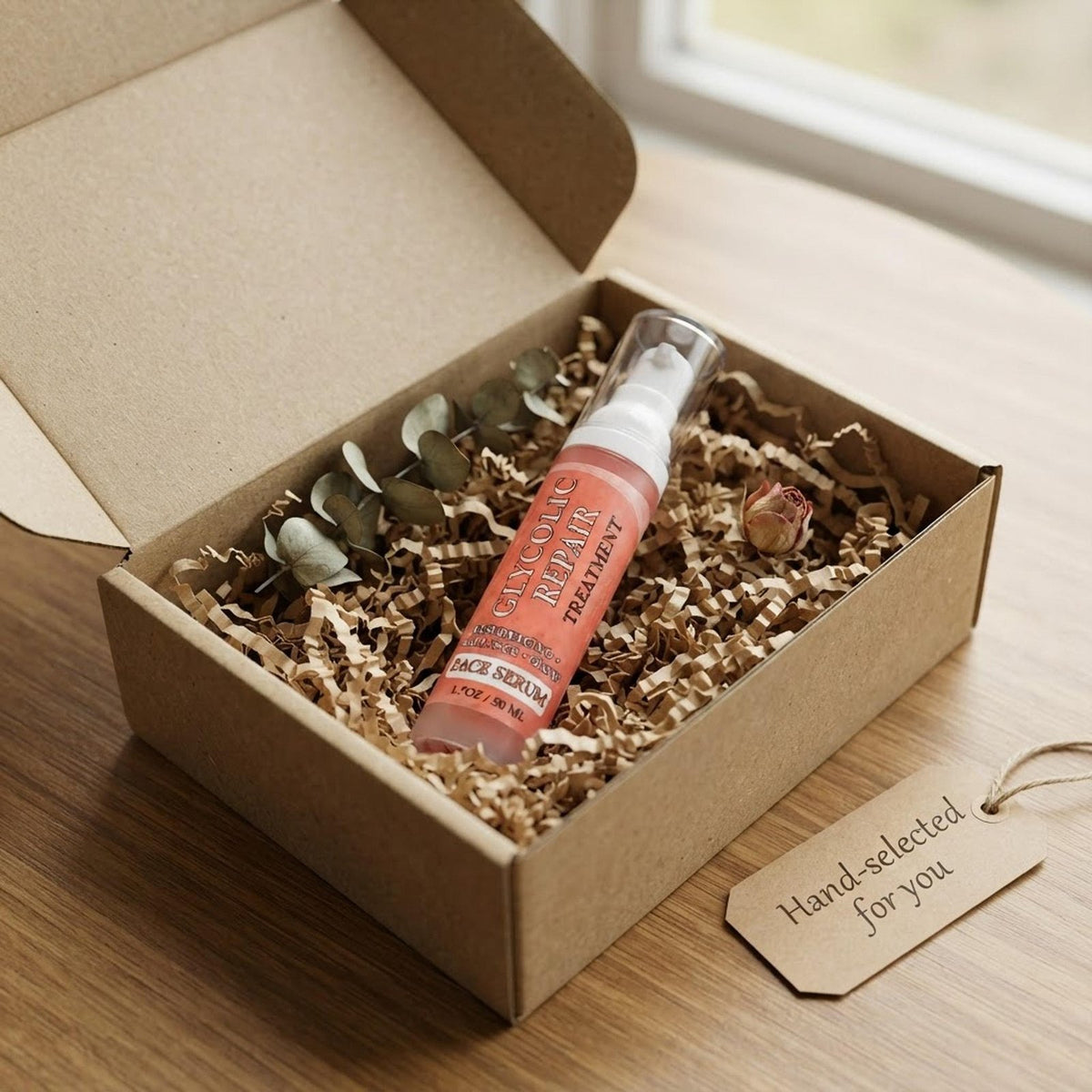 The Glycolic Renewal Serum bottle displayed in eco-friendly packaging for an unboxing view.