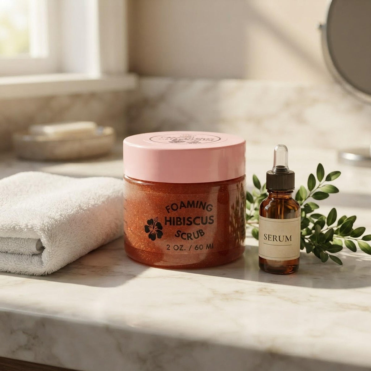 Natural Foaming Hibiscus Facial Scrub jar displayed on a bright marble bathroom vanity with white towels and greenery.