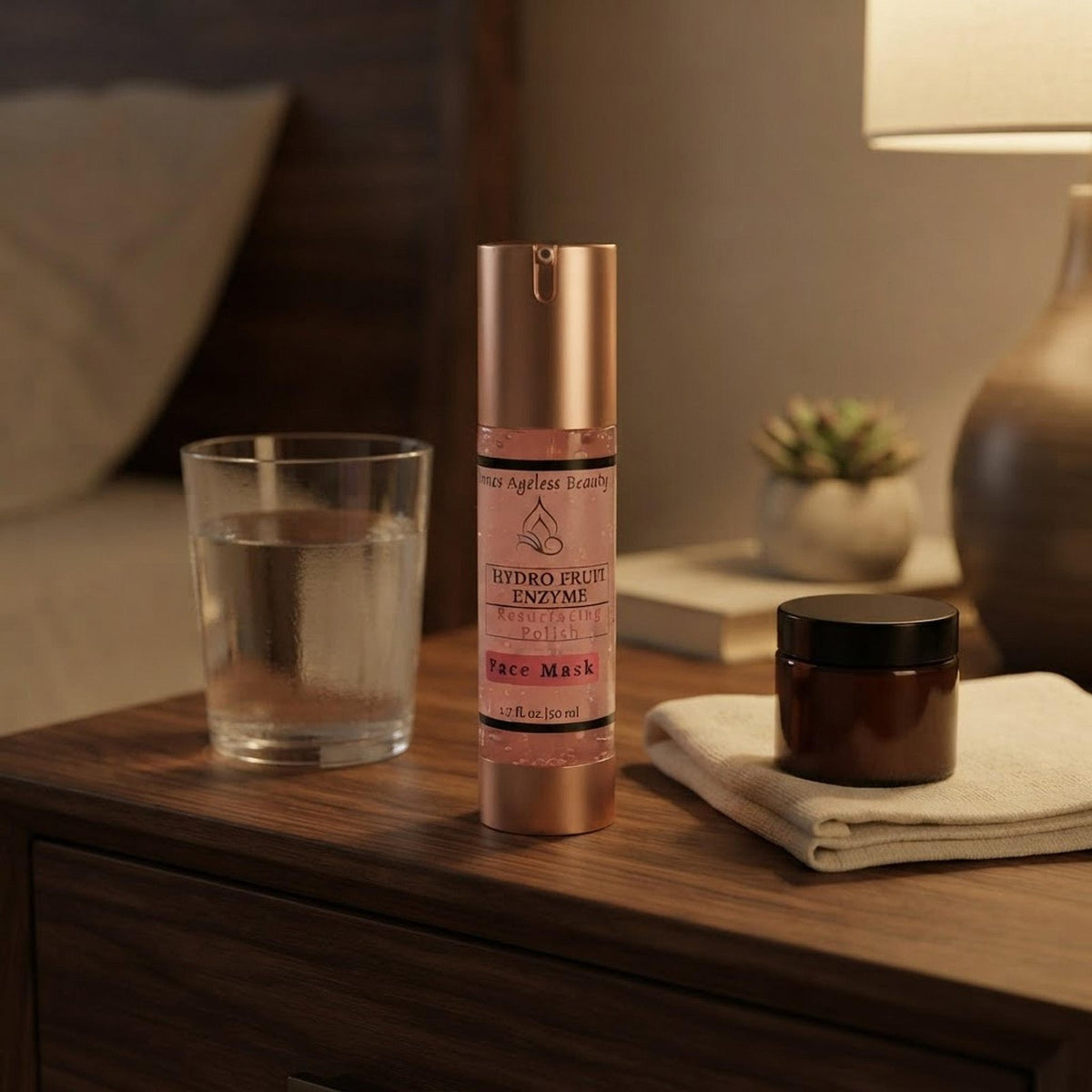 Innes Ageless Beauty Hydro Fruit Enzyme Resurfacing Polish bottle on a wooden nightstand under warm evening lamp light