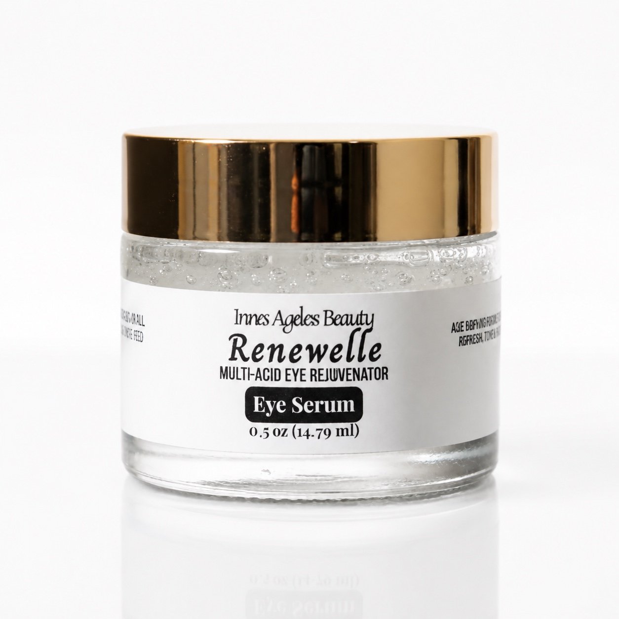 Innes Ageless Beauty Renewelle Multi-Acid Eye Rejuvenator Serum in a 0.5 oz clear jar with a gold lid on a white background