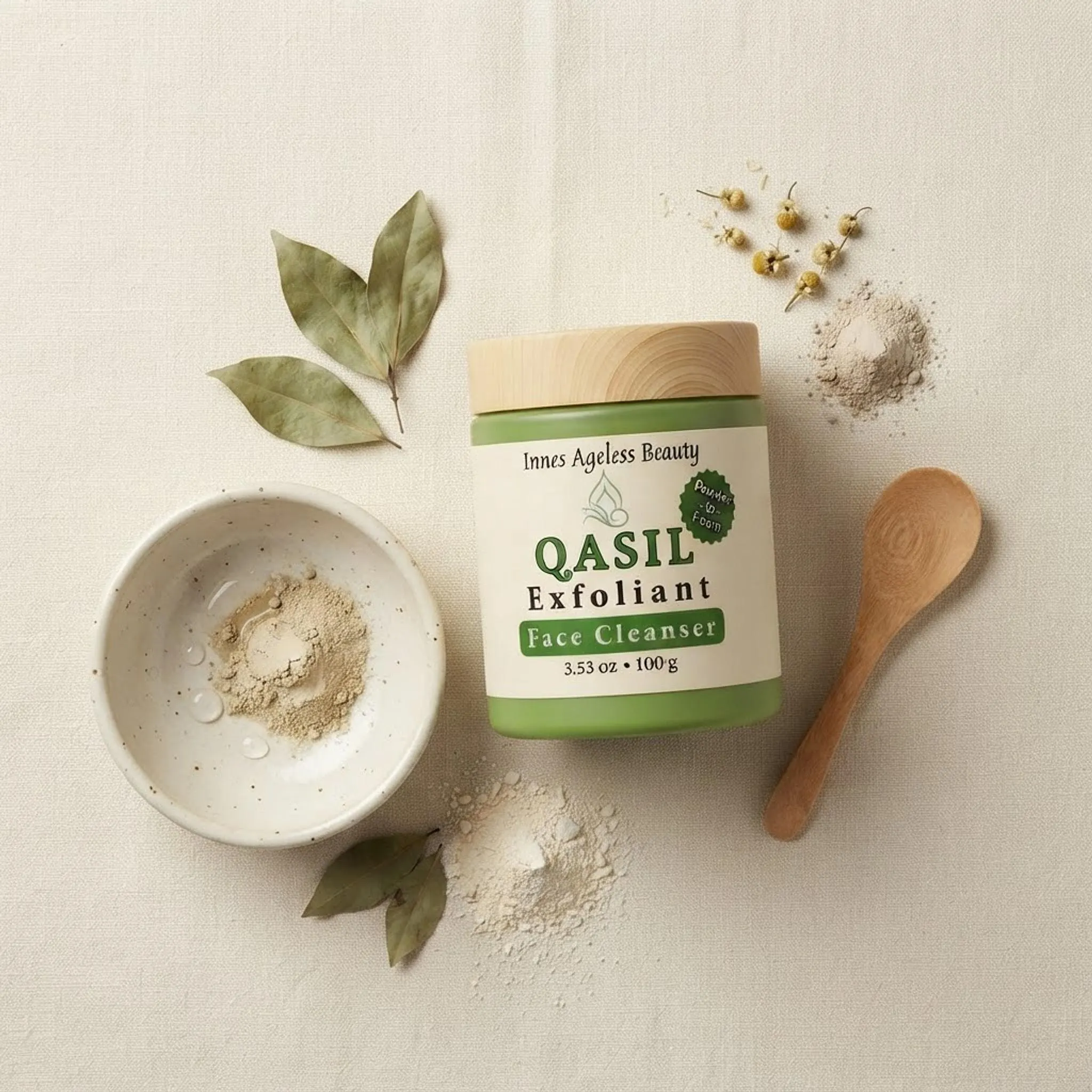 Flat lay showing the Qasil Exfoliant Face Cleanser jar, wooden spoon, and ceramic bowl on a neutral surface