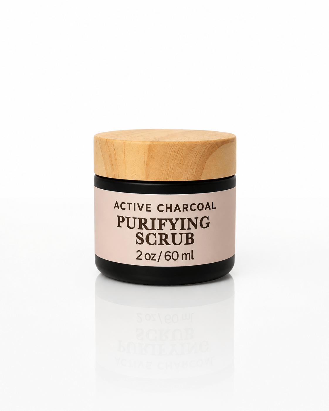 Innes Ageless Beauty Active Charcoal Purifying Face Scrub 2 oz jar with wooden lid on a white background